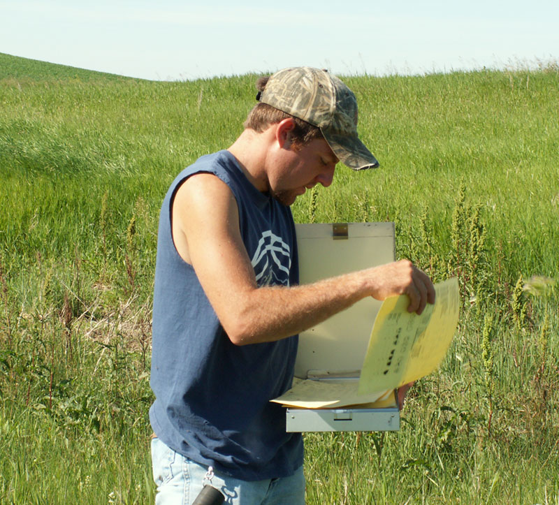 student conducting field work